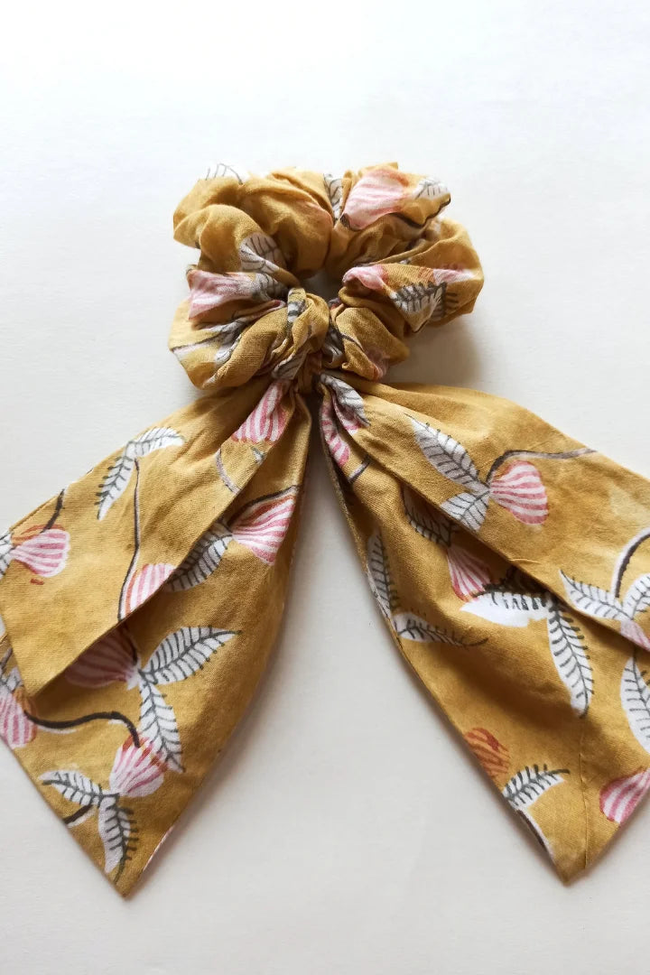 ilamra hand block printed naturally dyed organic cotton Mustard yellow, hints of dirty green and red upcycled cotton pastel shade scrunchie