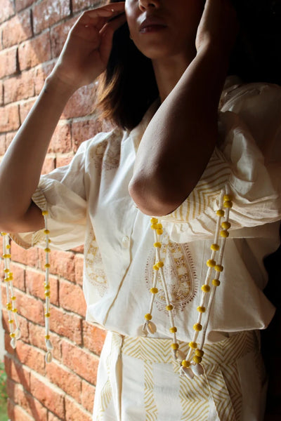 Ilamra hand block printed sustainably made naturally dyed off-white top with yellow print
