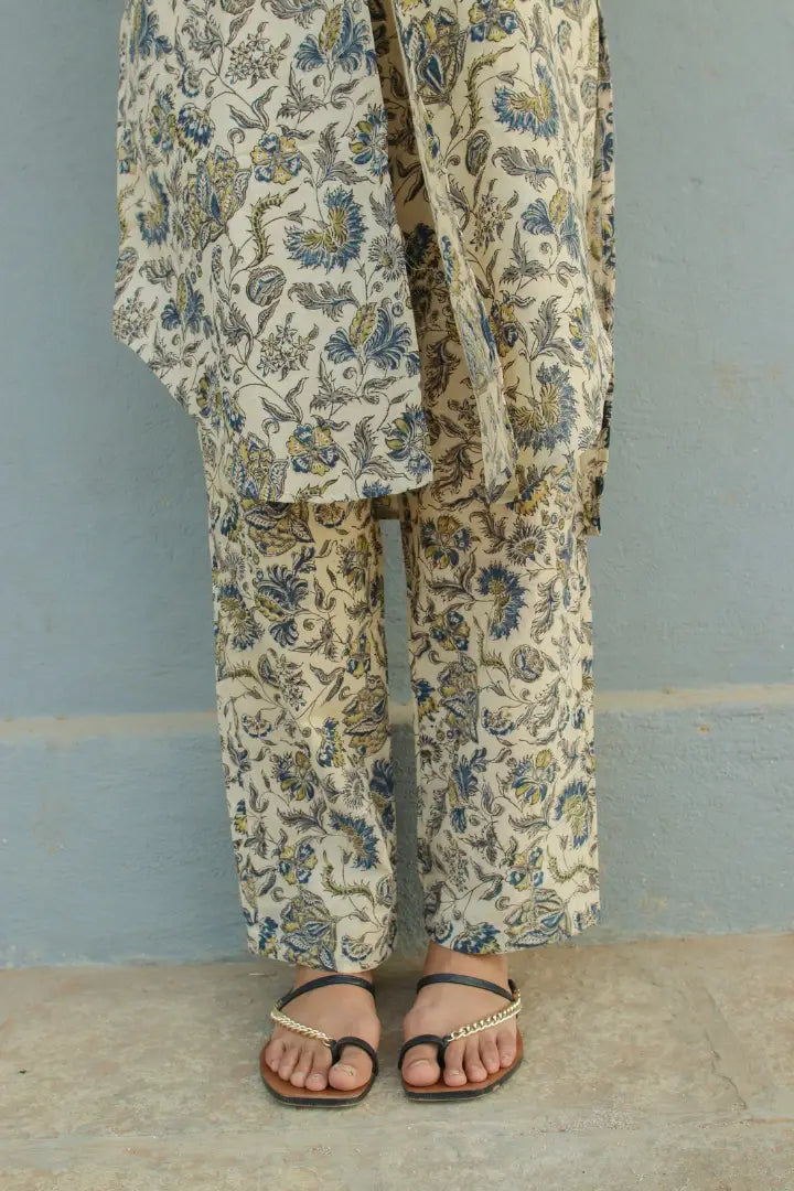 Ilamra kalamkari craft hand block printed organic cotton indigo, yellow and brown kurta and pants set.