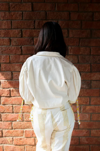 ilamra hand block printed naturally dyed organic cotton white pants with yellow print