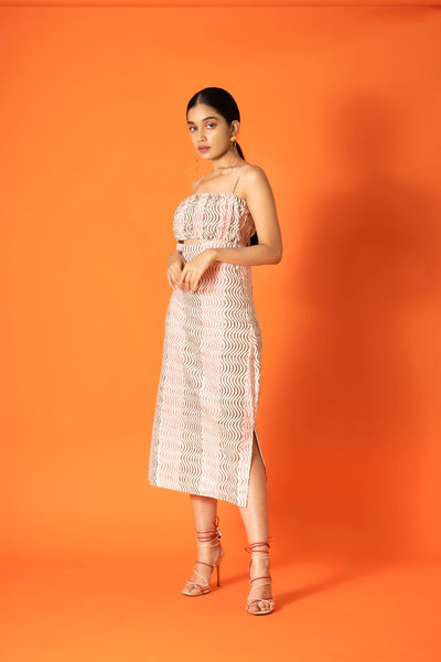 Ilamra hand block printed sustainably made naturally dyed wavy print pink and brown cut-out dress