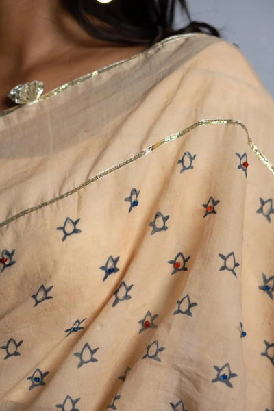 Ilamra kalamkari craft hand block printed organic cotton Beige base with indigo and red motifs saree