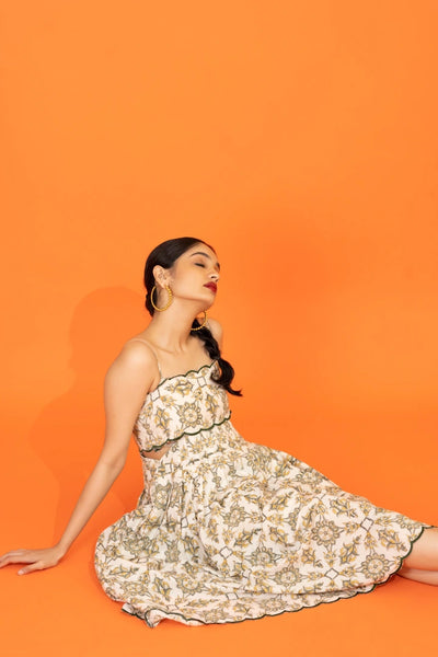 Ilamra hand block printed sustainably made naturally dyed yellow and dirty green on off-white chic cut-out dress