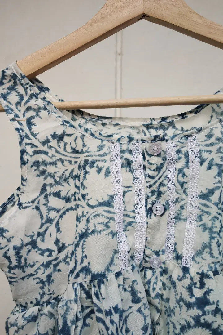 Ilamra sustainable clothing organic cotton Indigo, off-white, hints of fresh green and madder red hand block printed frilly top