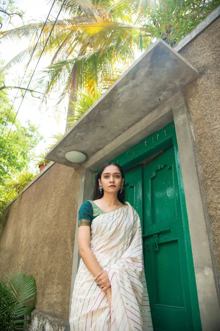 Ilamra sustainable clothing organic cotton Off-White, dirty Green, blush pink, orange and hints of gold hand block printed saree