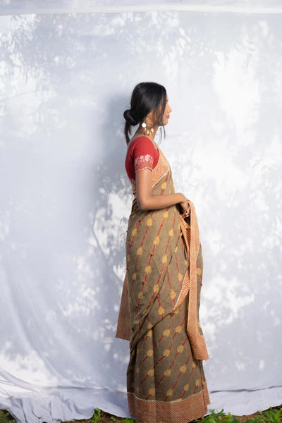 Ilamra kalamkari craft hand block printed organic cotton Brownish green base with a madder red border and beige motifs saree