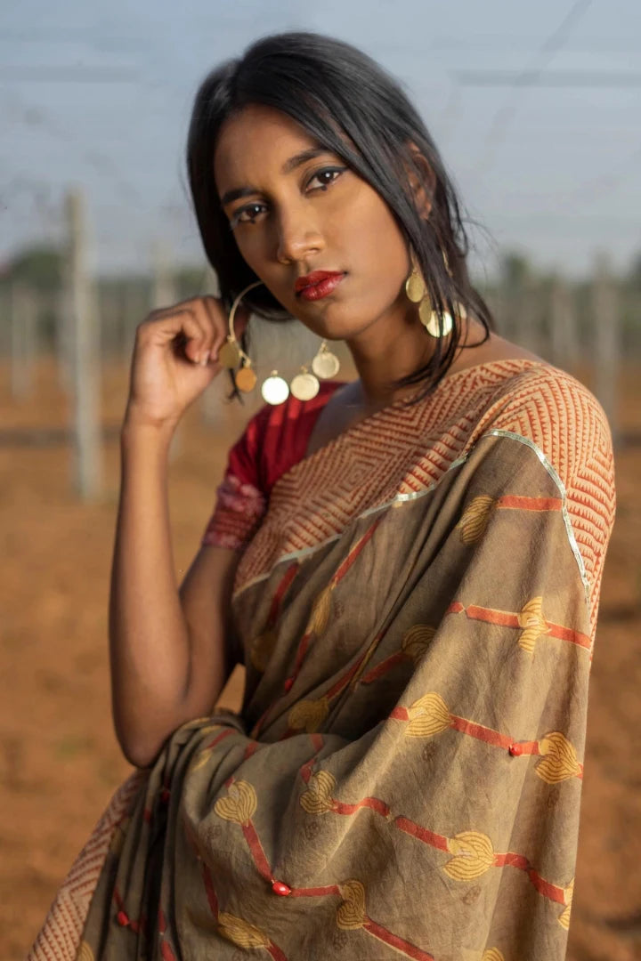 Ilamra kalamkari craft hand block printed organic cotton Brownish green base with a madder red border and beige motifs saree