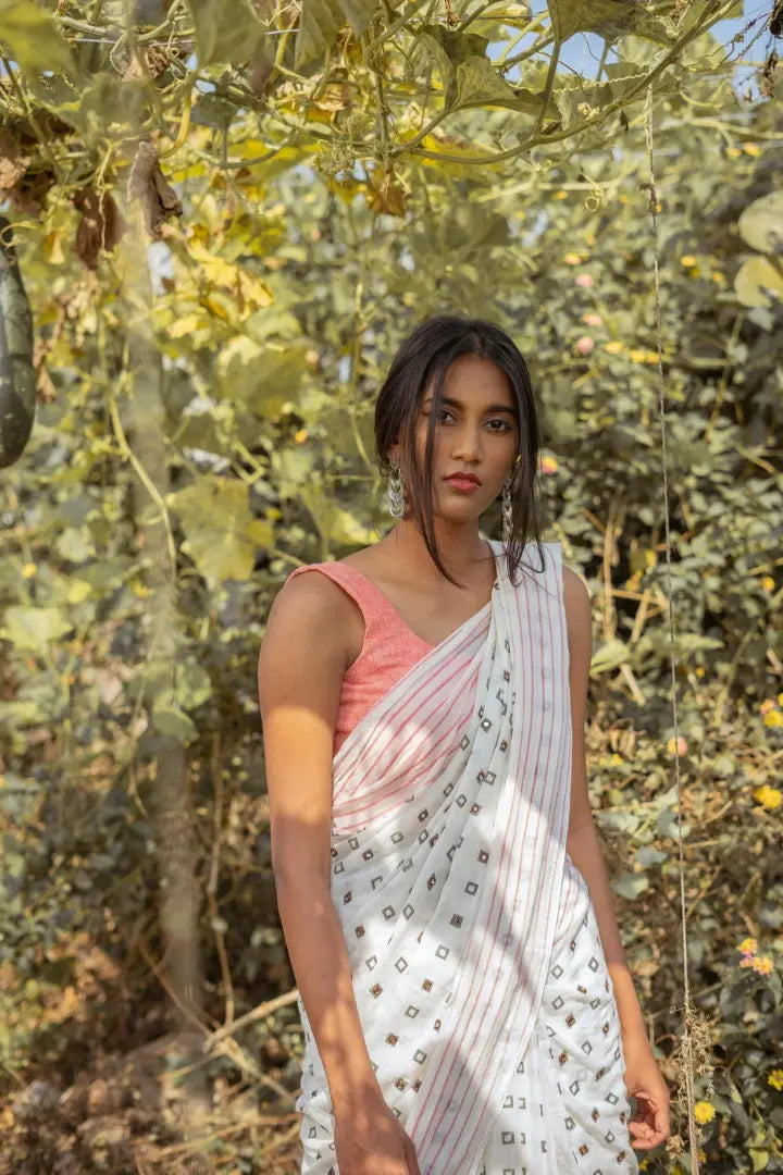 Ilamra kalamkari craft hand block printed organic cotton Pebble white saree with Madder red, black and mustard yellow detailing saree