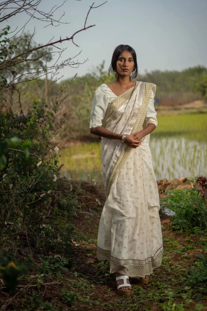 Ilamra kalamkari craft hand block printed organic cotton Pebble white base with an olive green border and silver detailing saree