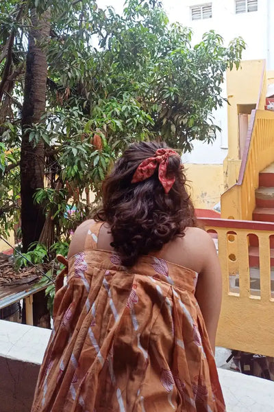 ilamra hand block printed naturally dyed organic cotton Orange, Madder Red, and Off-White quirky and fun dress
