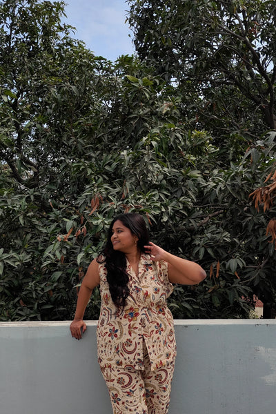 Ilamra hand block printed Kalamkari art organic cotton naturally dyed in shades of Indigo, madder red and warm mustard, overlapping waistcoat that is double-breasted, classic notched collar, relaxed fit pants