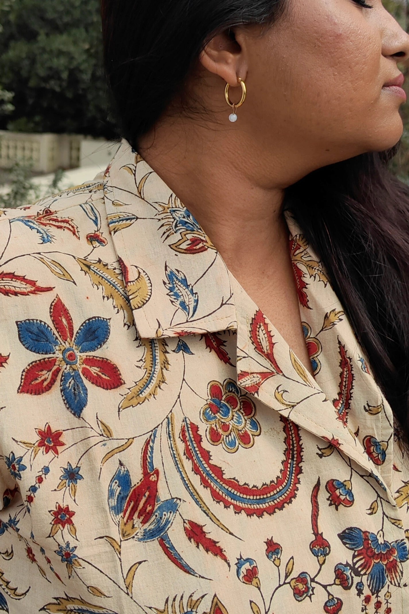 Ilamra hand block printed Kalamkari art organic cotton naturally dyed in shades of Indigo, madder red and warm mustard, overlapping waistcoat that is double-breasted, classic notched collar, relaxed fit pants