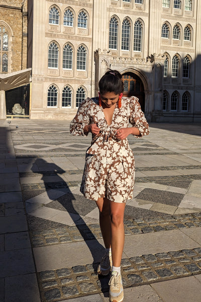 Ilamra hand block printed Kalamkari art organic cotton naturally dyed in deep cocoa brown on a pale white background, plunging neckline, wrist length sleeves, classy, cool, tie up puff top